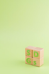 Obraz premium SDGs - sustainable development goals word concept on cubes