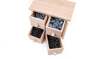 Wooden box for metal bolts, screws and nuts close up, metal self-tapping screws made of steel, self-tapping screw for metal, for iron, chrome-plated self-tapping screw,