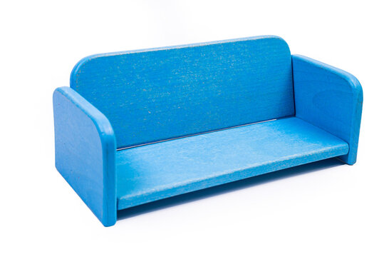 a wooden blue toy chair, a sofa, two chairs with a table, a yellow table, blue upholstered wooden chairs. yellow lamp on isolated white background