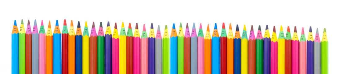 colored wooden pencils with faces have many emotions