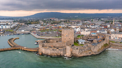 Fototapeta na wymiar Aerial view with Carrickfergus town and the castle, on East Coast in Northern Ireland UK