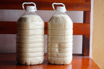 Two plastic bottles that contain grains of rice to prevent from dust or insects. DIY. Concept, reuse plastic bottle. Zero waste.      