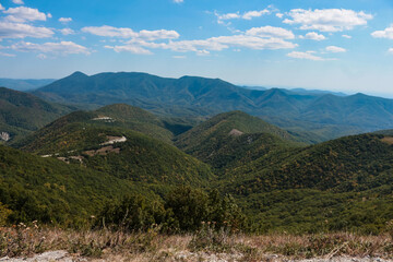 mountain ranges are green and yellow in daylight