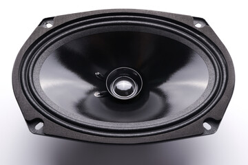 Black car sound speakers close-up on a white background, audio system, hard bass subwoofer