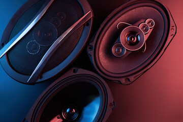 Black car sound speakers close-up on a black background, audio system, hard bass subwoofer