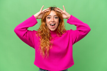 Young caucasian woman isolated on green screen chroma key background with surprise expression
