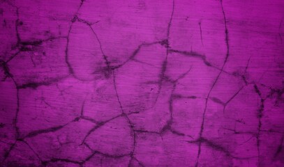 A textured purple concrete wall with a prominent vertical crack. 
