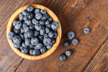 Blueberries and strawberries are prepared for breakfast.