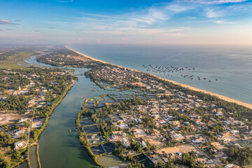 Fototapeta premium ancient town, asia, background, beach, beautiful, beauty, blue, boat, clear, cloud, coast, day, fish, fish market, fisherman, green, hoi an, hoian, holiday, horizon, landscape, natural, nature, ocean,