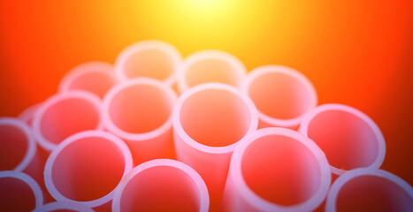 Background of the blue plastic pipes in stacked