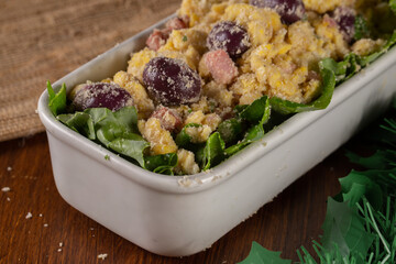 Brazilian farofa. Made from manioc flour, egg, bacon and sausage. Served for Christmas dinner