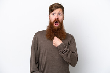 Redhead man with beard isolated on white background pointing to oneself