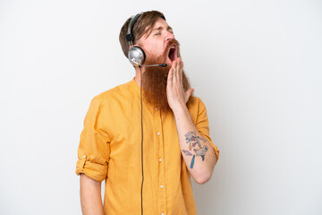 Telemarketer man isolated on white background yawning and covering wide open mouth with hand