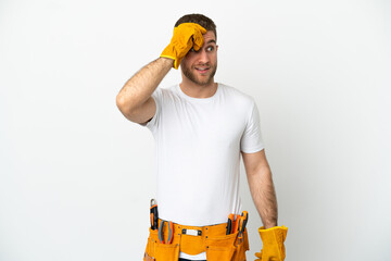 Young electrician man over isolated white wall doing surprise gesture while looking to the side