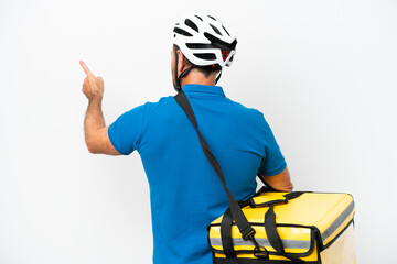 Middle age caucasian man with thermal backpack isolated on white background pointing back with the index finger