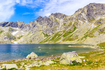 Fototapeta na wymiar Beautiful lake in Hinczowa valley on sunny summer day, High Tatra Mountains, Slovakia