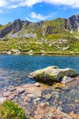 View of beautiful lake in Hinczowa valley on sunny summer day, High Tatra Mountains, Slovakia