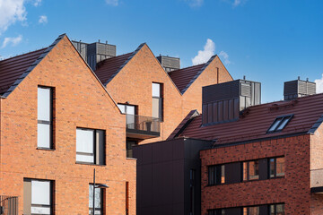 Fototapeta na wymiar Different condominium houses with brick modern architecture