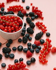 berries on a pink background