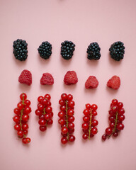 berries on a pink background