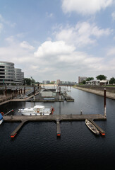 stilts and boats in port duisburg germany