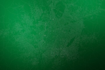 Map of the streets of Ibadan (Nigeria) made with white lines on abstract green background lit by two lights. Top view. 3d render, illustration