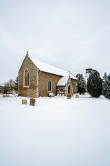 All Saints church in the small village of Sutton in the British countryside, it is totally covered...