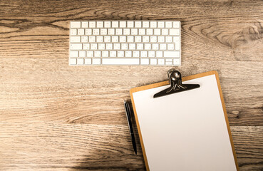 Fototapeta premium Paper tablet and keyboard