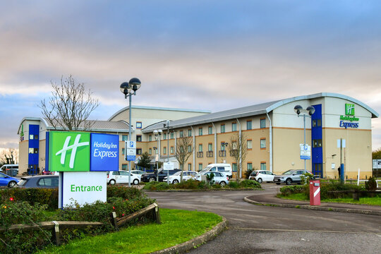 Rhoose, Wales - November 2022: Sign at the entrance to the Holiday Inn Express airport hotel at Cardiff Wales Airport