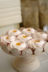 Sweet, buffet table with cakes, pies, cookies with glaze.