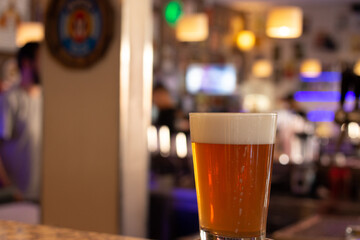 cold beer mug on a bar counter