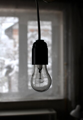 The bulb does not light due to the lack of electricity