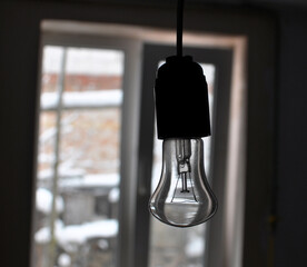 The bulb does not light due to the lack of electricity