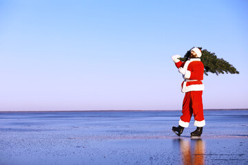 Santa Claus on ice skates goes to Christmas. Santa Claus hurries to meet the New Year with gifts...