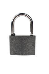 Naklejka premium Close-Up Of Padlock On White Background .