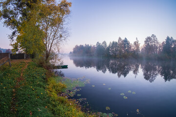 Naklejka na ściany i meble foggy morning on the lake
