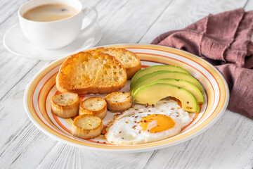 Fried eggs with avocado