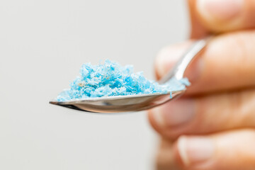 Microplastic in food, Environmental and health concept, Spoon with plastic particles, Negative impact of plastic