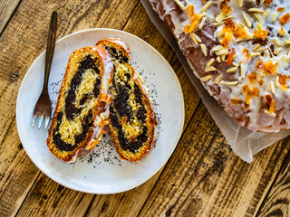 Poppy seed cake on wooden table
