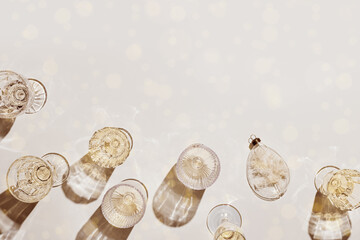 New Year holiday flat lay, white sparkling wine in crystal glasses, champagne drinks, Christmas...