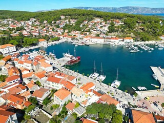 Obraz premium Jelsa Croatia town and harbour waterfront Hvar drone aerial view
