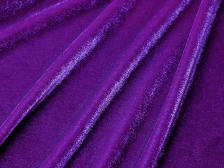 Fototapeta na wymiar Purple velvet fabric texture used as background. Empty purple fabric background of soft and smooth textile material. There is space for text.