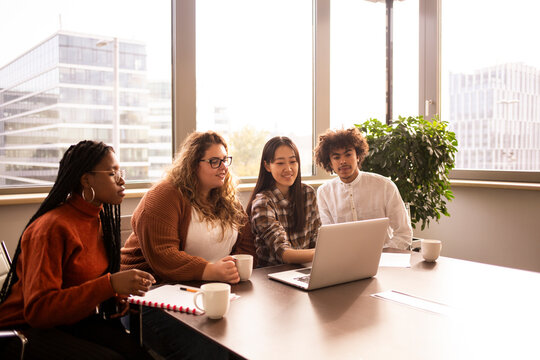 Group of young people working together in the office