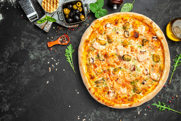 pizza with seafood on a dark background, banner, menu, recipe place for text, top view