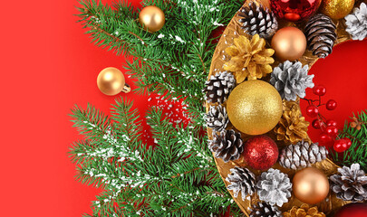Christmas wreath on a red background fragment