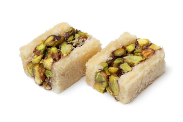 Pair of traditional Syrian cookies stuffed with nuts isolated on white background