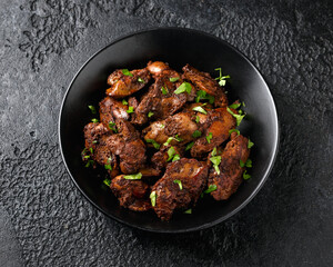 Fried chicken liver, poultry meat food with herbs