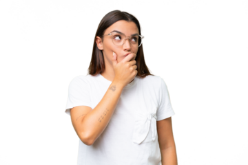 Young caucasian woman isolated on green chroma background having doubts and with confuse face expression