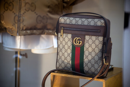 Strasbourg - France - 26 November 2022 - Closeup of brown handbag by Gucci in a luxury fashion store showroom