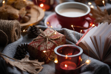  cup of coffee, gift and candles